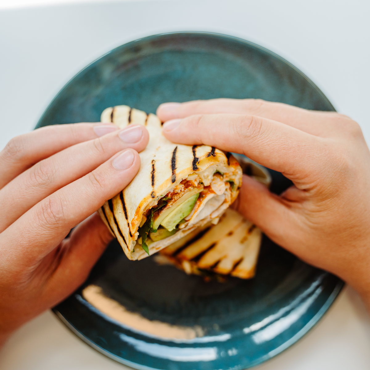 Chicken & Avocado Enchilada Breakfast Burrito
